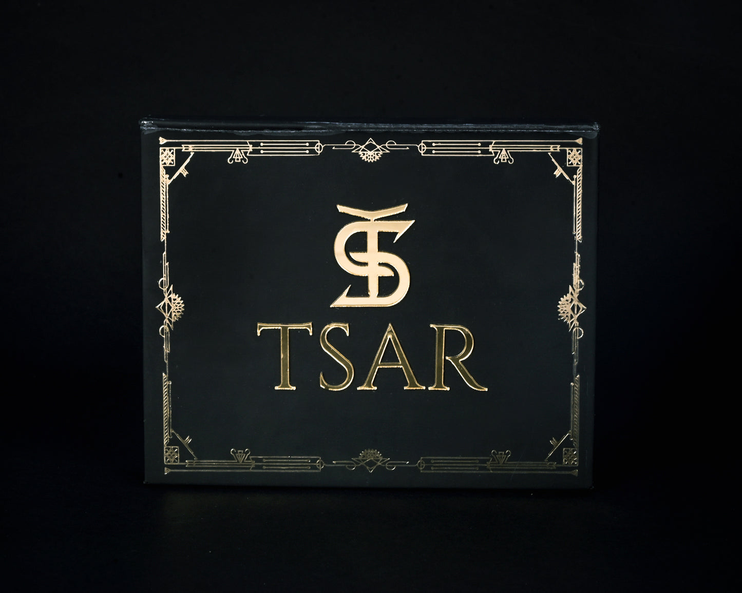 Black box with gold 'TSAR' logo on a black background