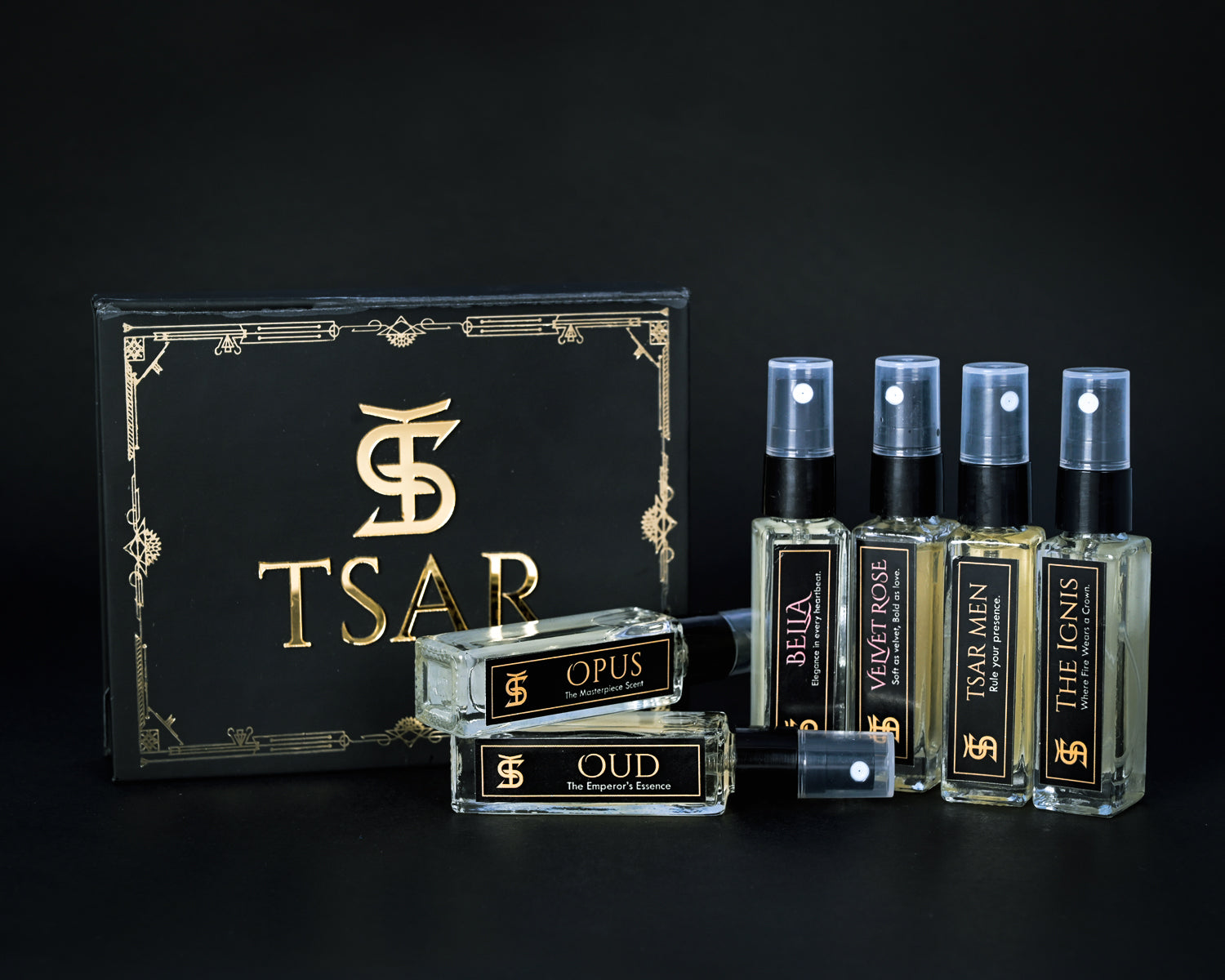 TSAR perfume set with bottles and packaging on a black background